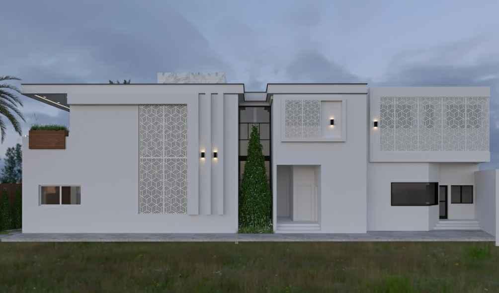 Villa contemporaine plain-pied par Youmé Mbengue Architecte. Façade blanche épurée avec motifs géométriques décoratifs et éclairage architectural moderne.